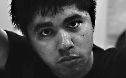 close up black and white image of a man